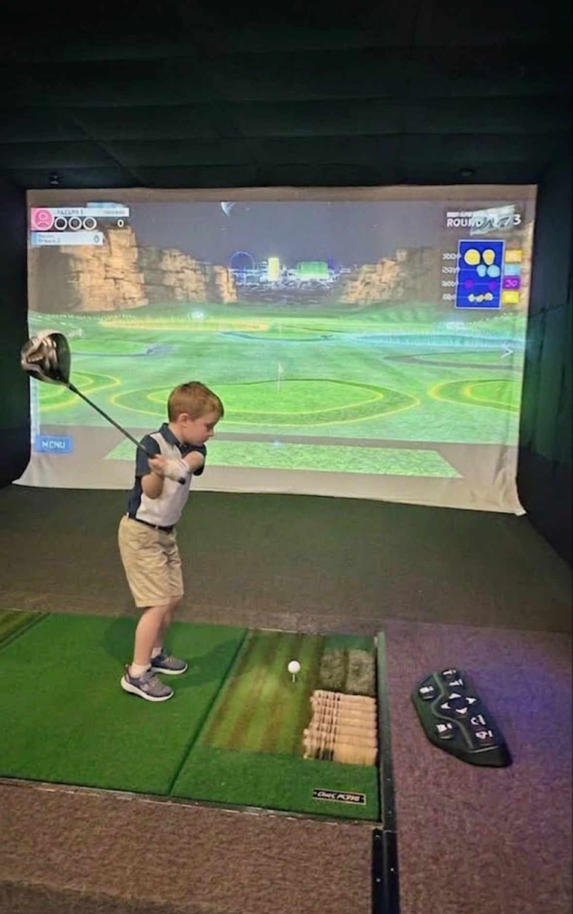 Night Glow Range game at GolfCube Social